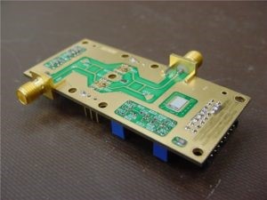 Small rectangular shaped, gold colored metal High power RF PCB technology