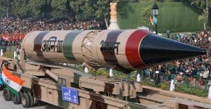 Brown and red colored Agni III missile model